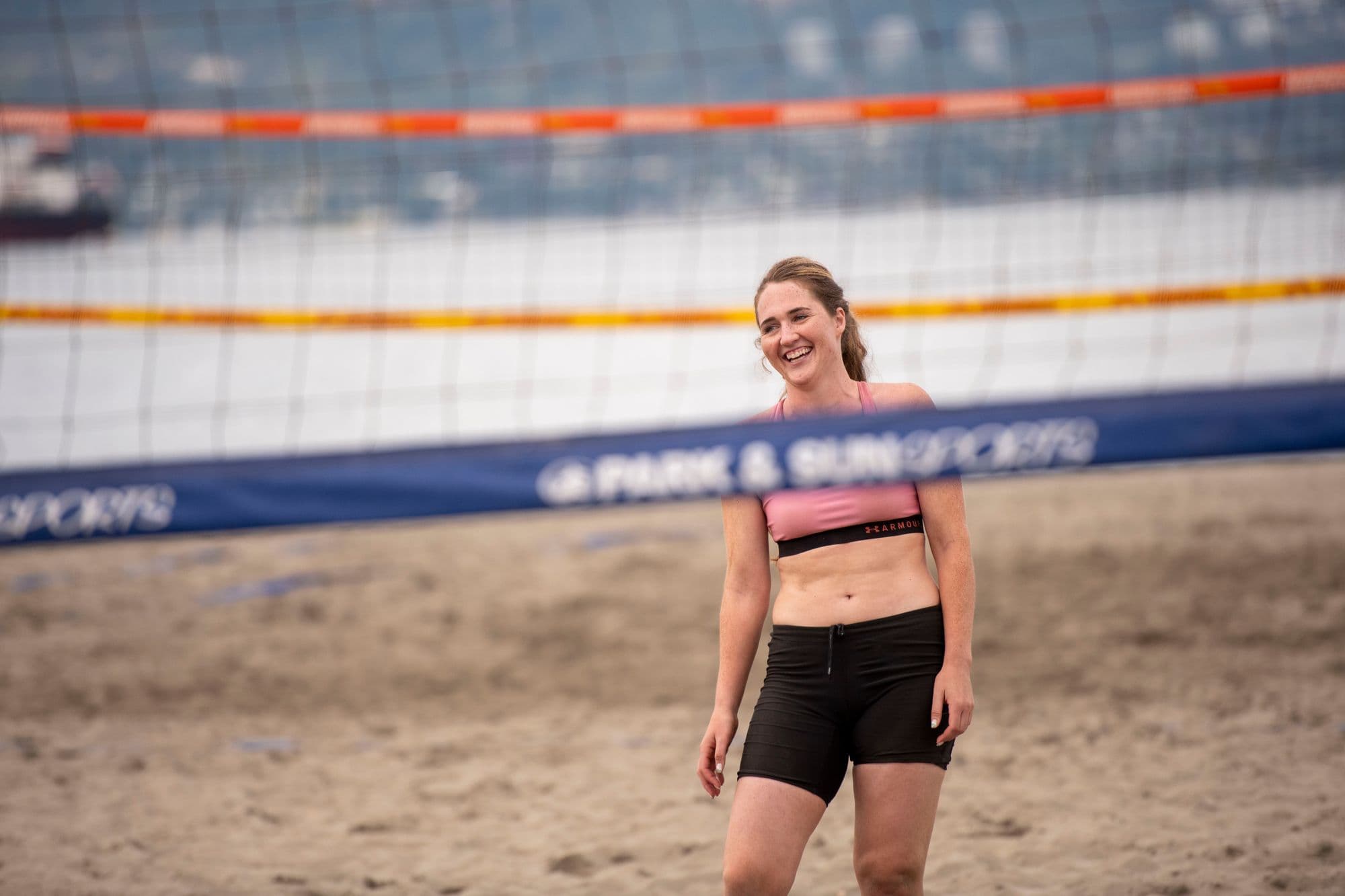 Beach volleyball player smiling